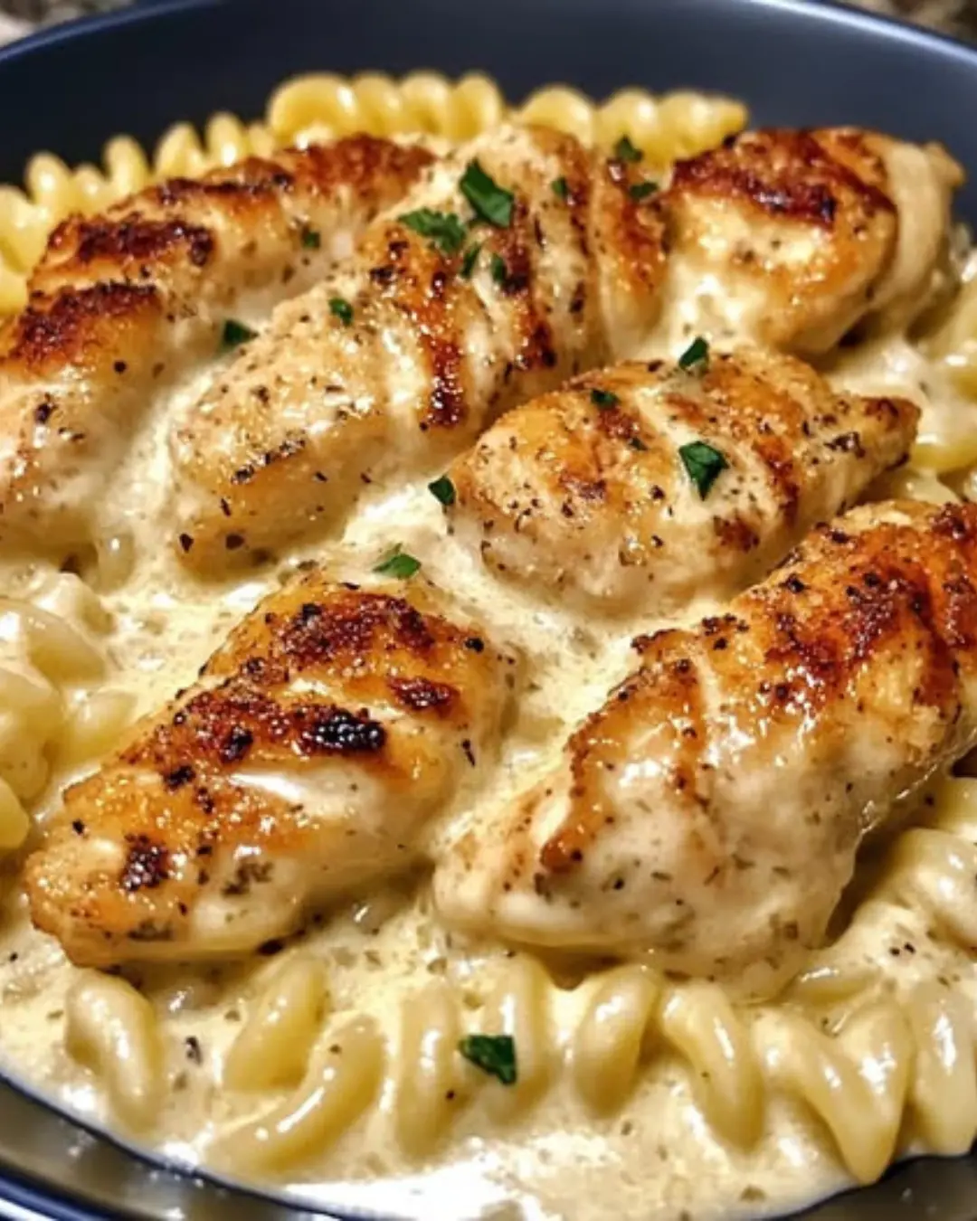 Creamy Garlic Butter Chicken and Rotini in Parmesan Sauce